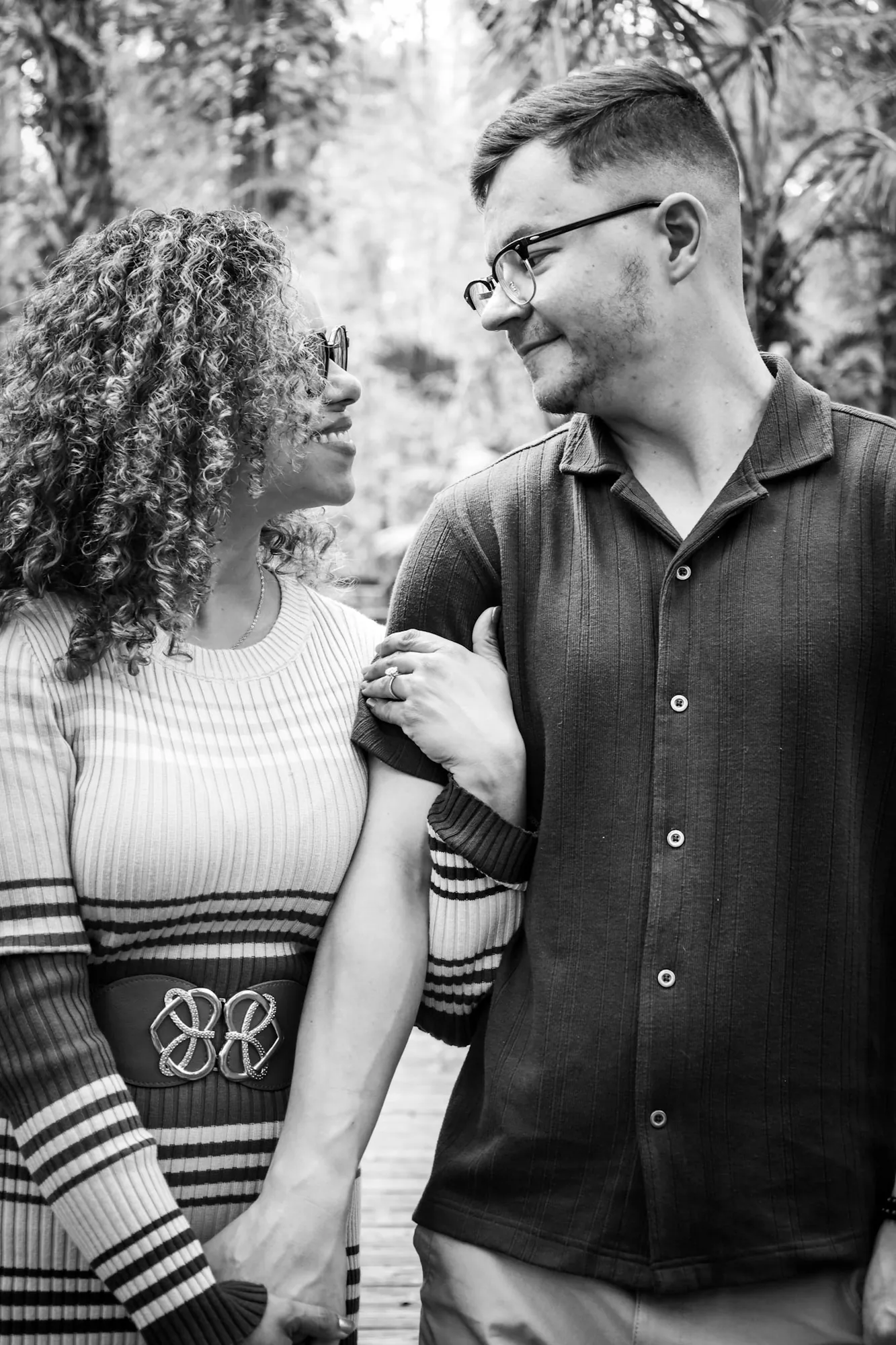 Candid golden-hour engagement moment at Eureka Springs Park, Tampa — fine art photography by Cute Company Photography in Plant City & Tampa, FL